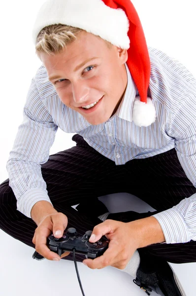 Рождественский мальчик играет в видеоигры — стоковое фото