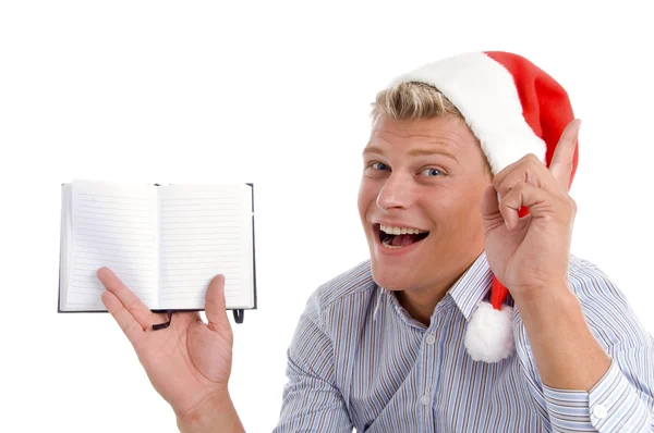 Pointing man showing diary — Stock Photo, Image