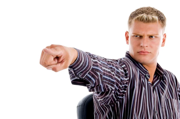 Young male pointing in front of camera — Stock Photo, Image