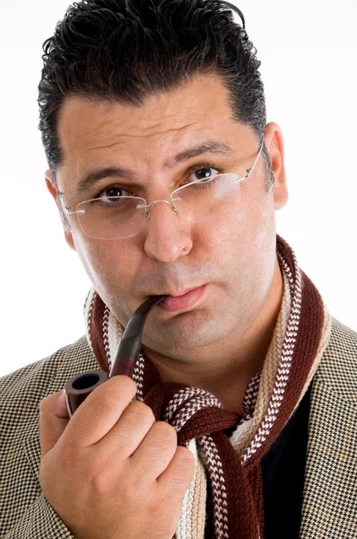 Close up of adult man smoking pipe — Stock Photo, Image