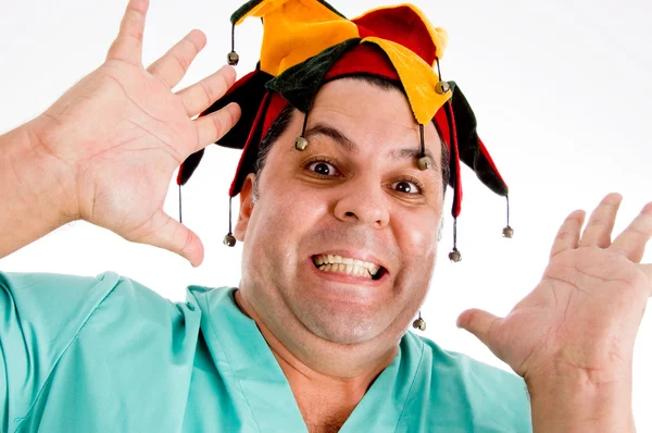 Adulto médico usando chapéu colorido — Fotografia de Stock
