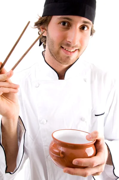 Giovane chef con bacchette e ciotola — Foto Stock