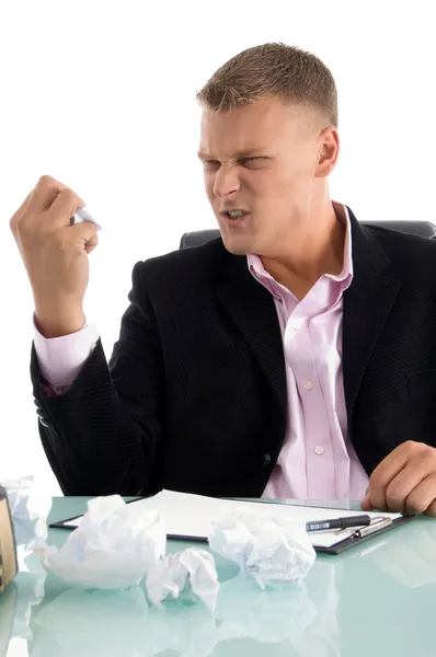Angry businessman crushing paper — Stock Photo, Image
