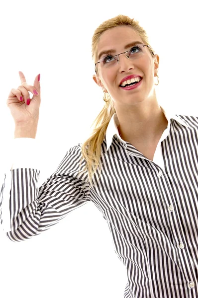 Businesswoman pointing up — Stock Photo, Image