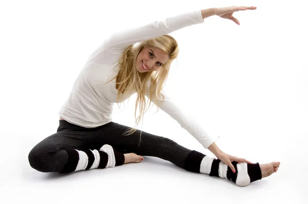 Donna stretching ed esercizio fisico — Foto Stock