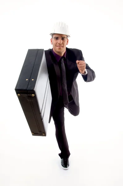 Young architect in running gesture — Stock Photo, Image