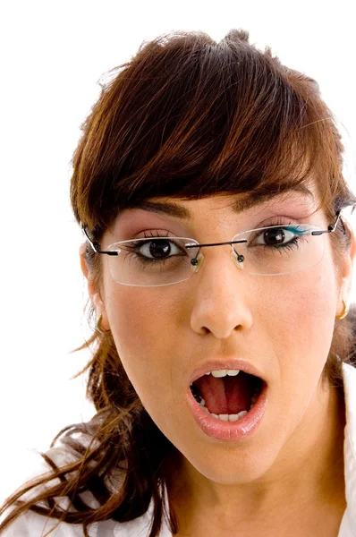 Shocked young female looking at camera — Stock Photo, Image