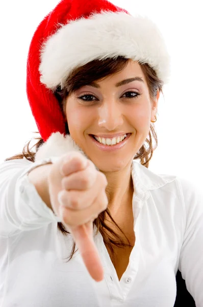 Vánoční žena s palec dolů — Stock fotografie