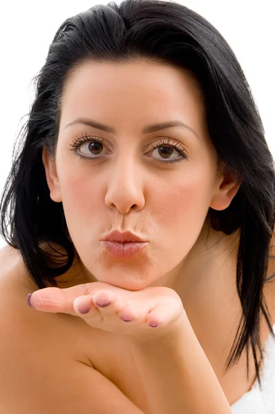 Young female giving flying kiss — Stock Photo, Image