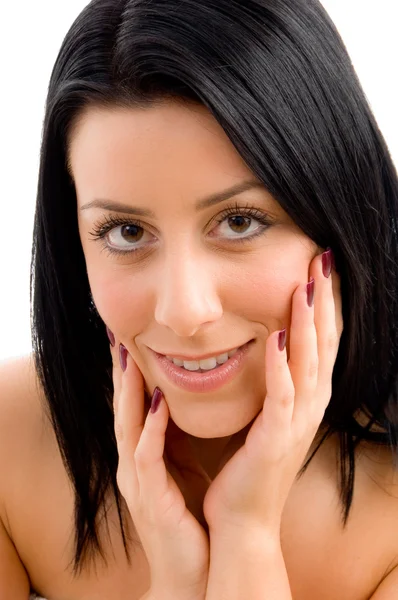 Smiling young female looking at camera — Stock Photo, Image
