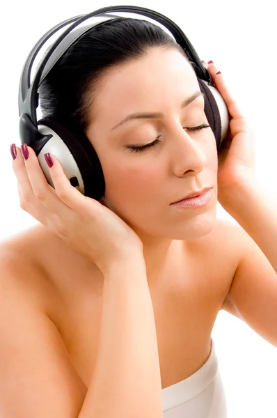 Young female enjoying music — Stock Photo, Image