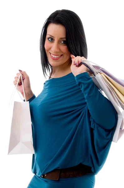 Smiling model with carry bags — Stock Photo, Image