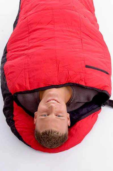 Bonito homem no saco de dormir — Fotografia de Stock
