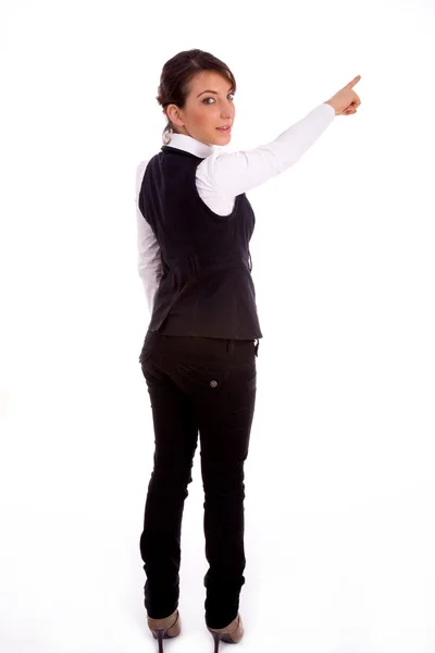 Back pose of businesswoman pointing — Stock Photo, Image