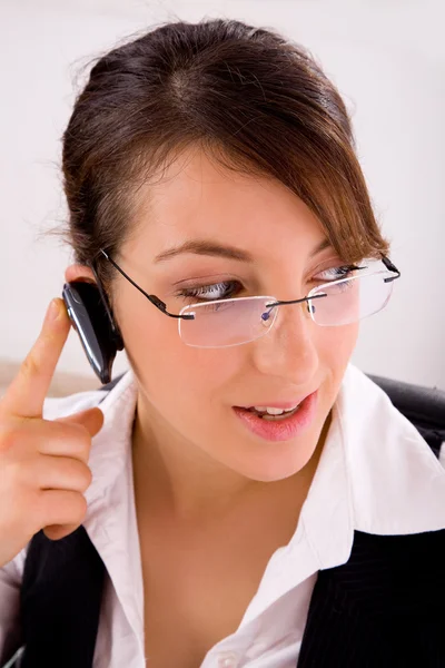 Service provider talking with blue-tooth — Stock Photo, Image
