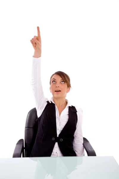 Businesswoman pointing upwards — Stock Photo, Image