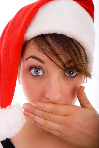 Frau mit leuchtenden Augen in Weihnachtsmütze — Stockfoto