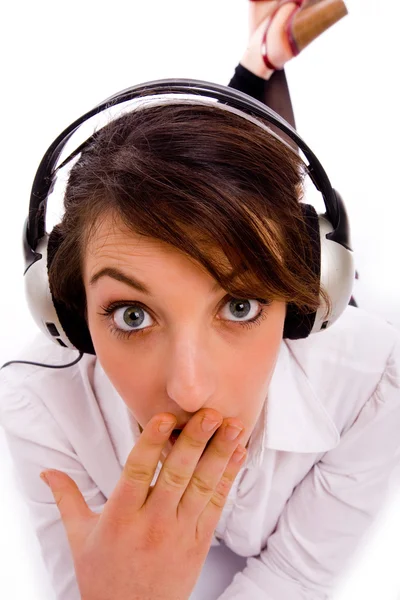 Surprised woman enjoying music — Stock Photo, Image