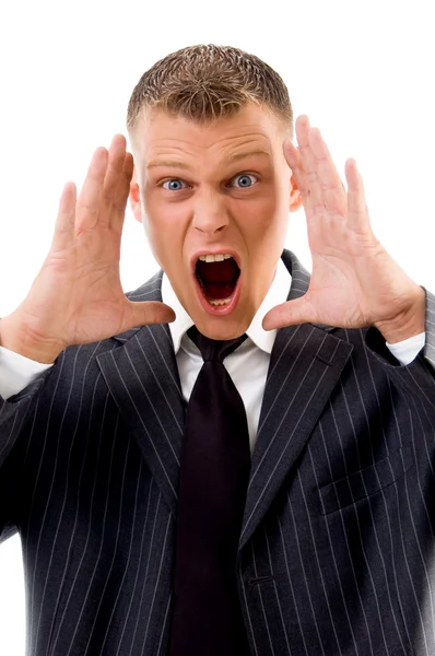 Стрессовый молодой бизнесмен кричит — стоковое фото