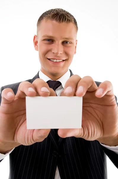 Smiling executive holding business card — Stock Photo, Image