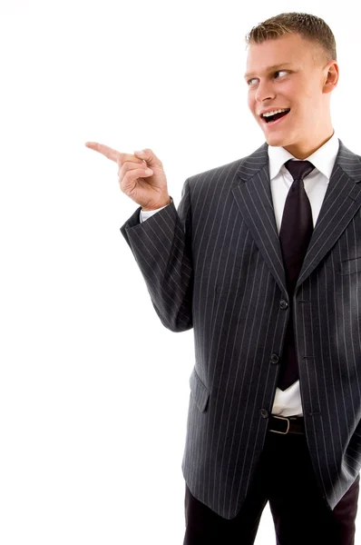 Corner view of pointing businessman — Stock Photo, Image