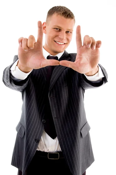 Businessman making frame gesture — Stock Photo, Image