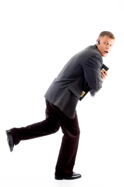 Scared businessman running — Stock Photo, Image