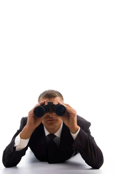 Young lawyer using a pair of binoculars — Stock Photo, Image
