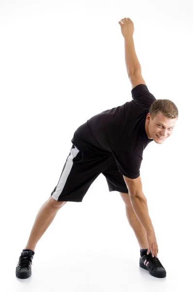 Handsome guy doing exercise — Stock Photo, Image