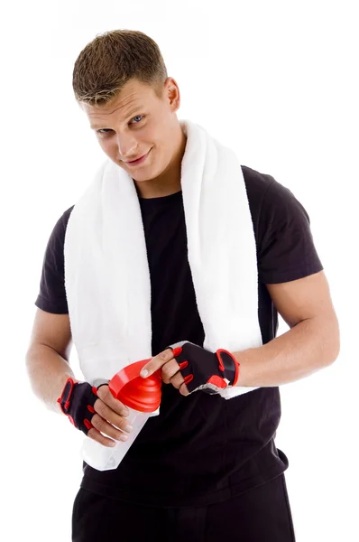 Man opening the cap of water bottle — Stock Photo, Image