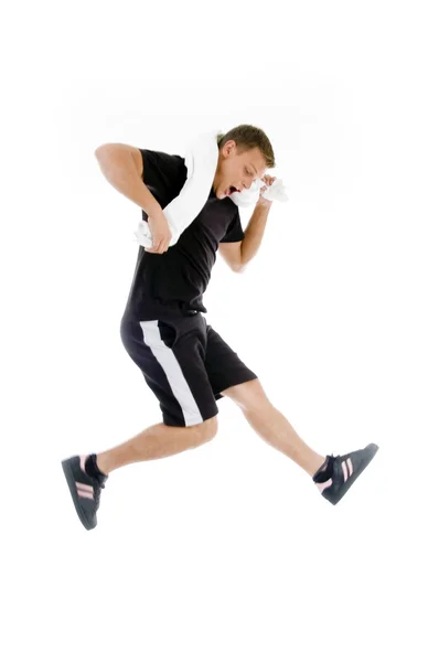 Fitness man jumping in mid air — Stock Photo, Image
