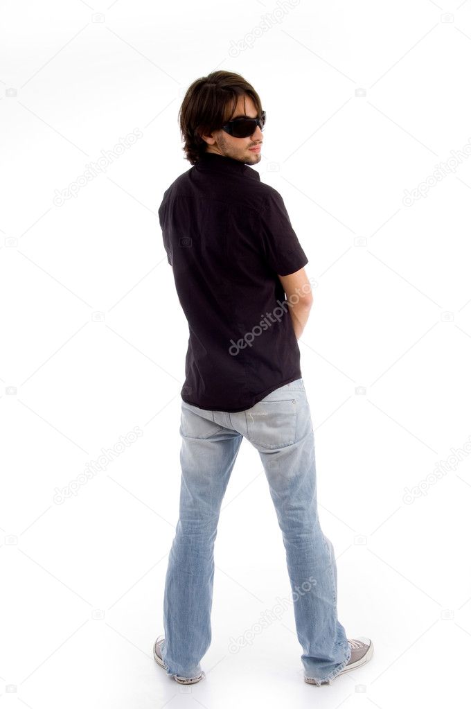 Back pose, full length shot of a young man looks ahead Stock Photo - Alamy