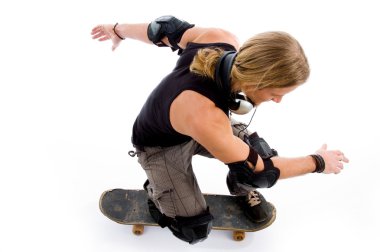 Young man on skateboard clipart