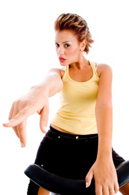 Pointing female looking at camera clipart