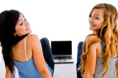 Back pose of school girls with notebook clipart