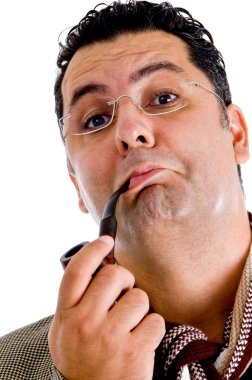 Close up of man smoking tobacco pipe clipart