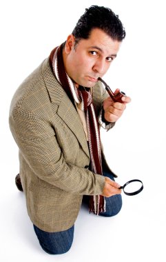 Detective with magnifier smoking pipe clipart