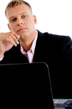 Young businessman with laptop clipart