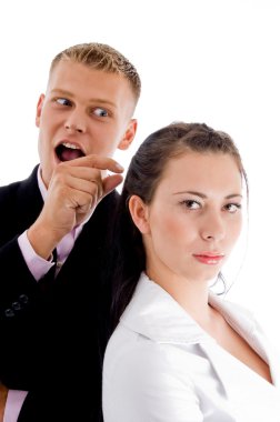 Man pointing at woman's back clipart