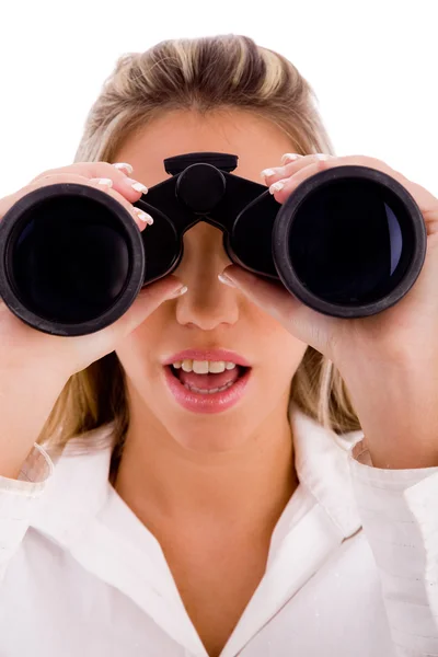 Businesswoman looking through binocular — Stock Photo, Image
