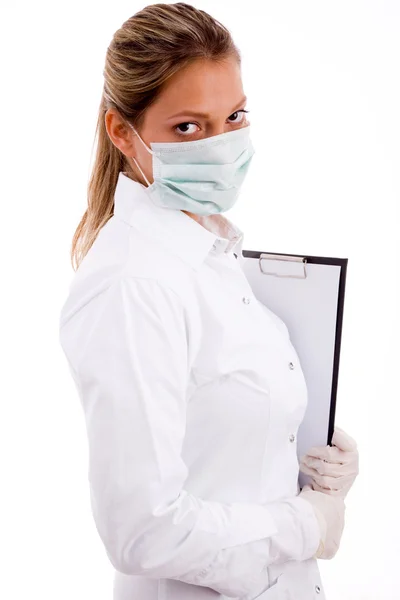 Profissional médico com almofada de escrita — Fotografia de Stock