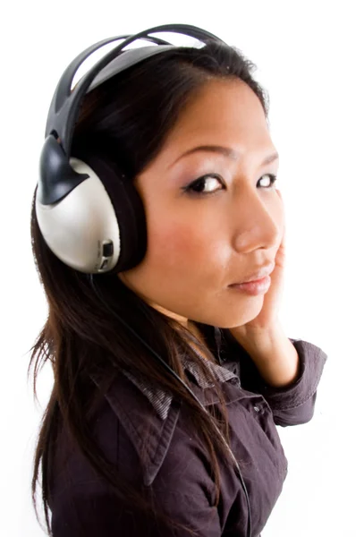 Asian female enjoying music — Stock Photo, Image