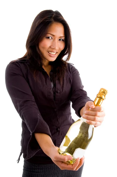 Asiático feminino segurando garrafa de champanhe — Fotografia de Stock