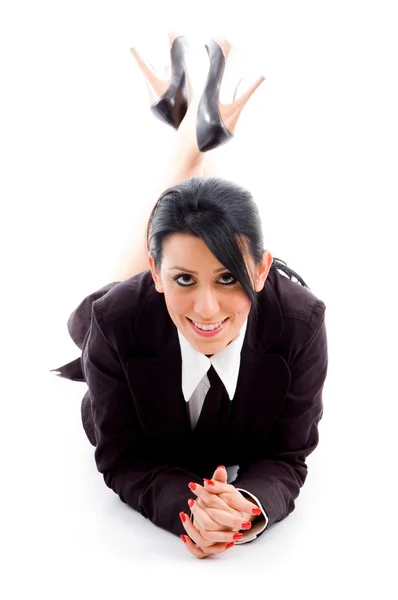 Businesswoman on floor looking at camera — Stock Photo, Image