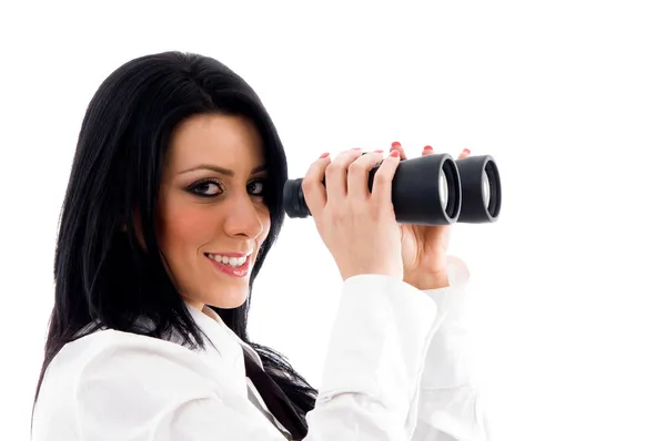 Mujer mirando a través de binoculares —  Fotos de Stock