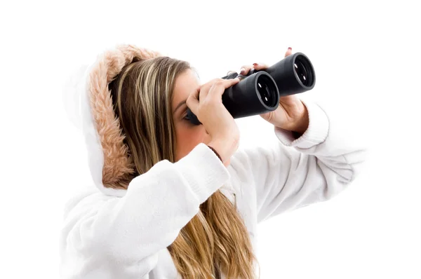Žena něco pozoroval dalekohledem — Stock fotografie