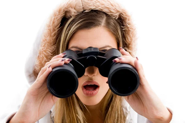 Beautiful woman watching with binoculars — Stock Photo, Image