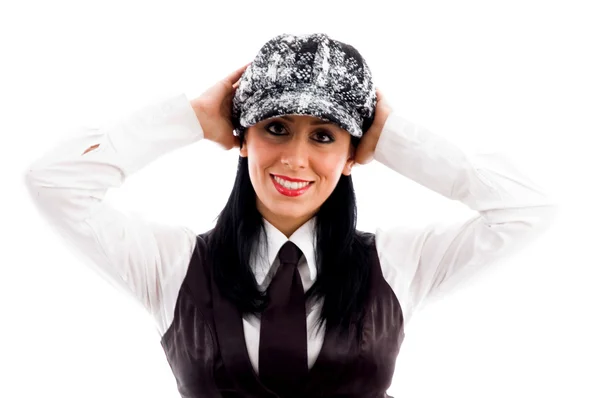 Pretty woman in cap posing — Stock Photo, Image