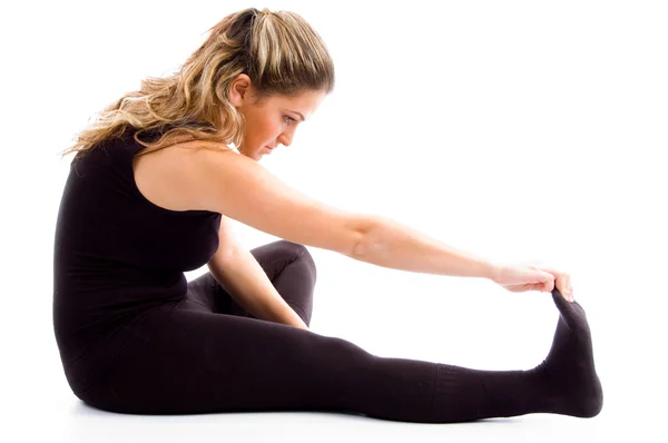 Side pose of stretching female — Stock Photo, Image