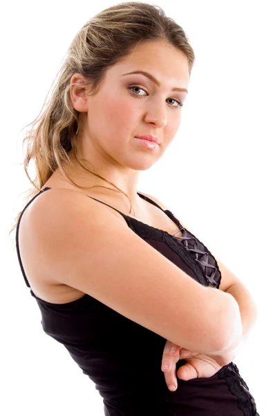 Side pose of model with folded arms — Stock Photo, Image
